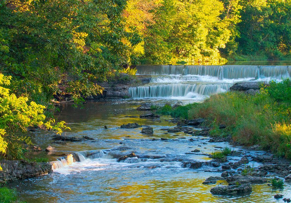 _0005_GettyImages-1914628146 A river with water running over the side of it.