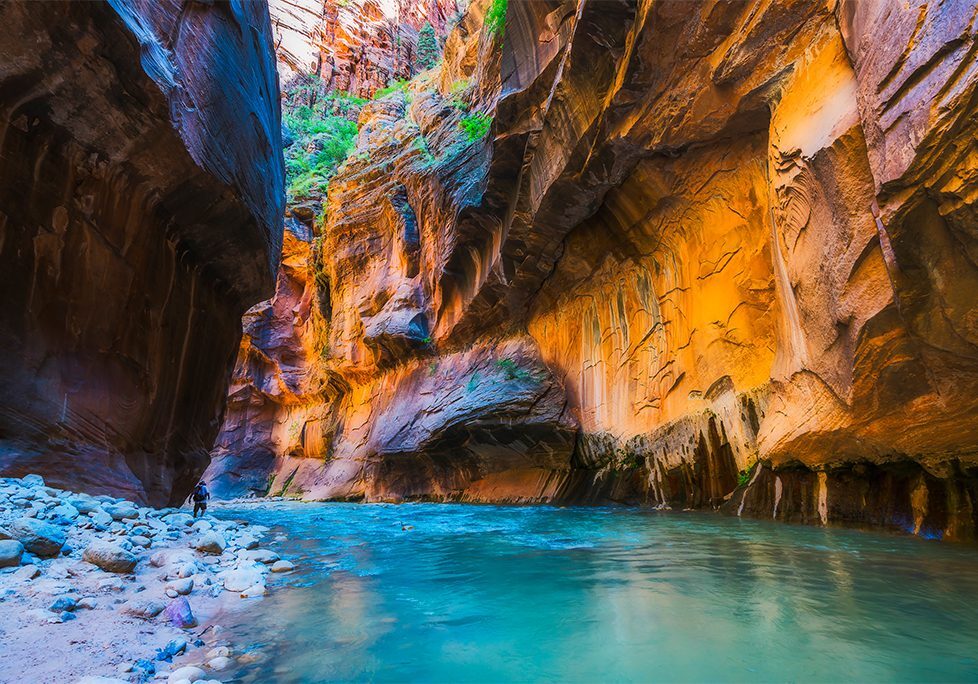 A river flowing through the middle of a canyon.